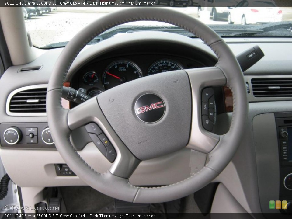 Dark Titanium/Light Titanium Interior Steering Wheel for the 2011 GMC Sierra 2500HD SLT Crew Cab 4x4 #39204623