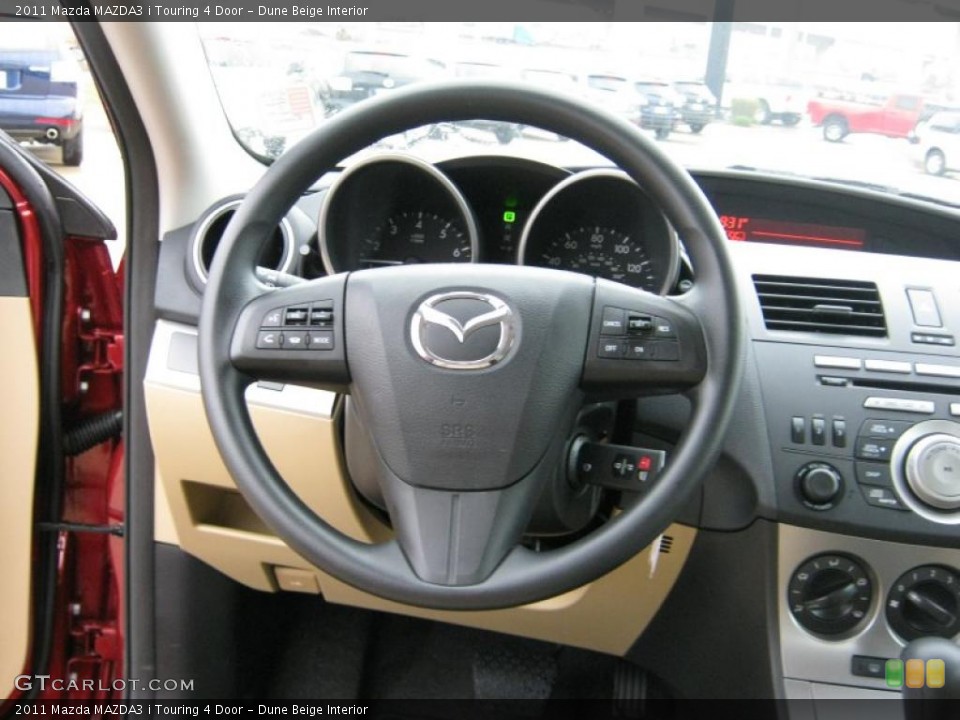 Dune Beige Interior Steering Wheel for the 2011 Mazda MAZDA3 i Touring 4 Door #39208382