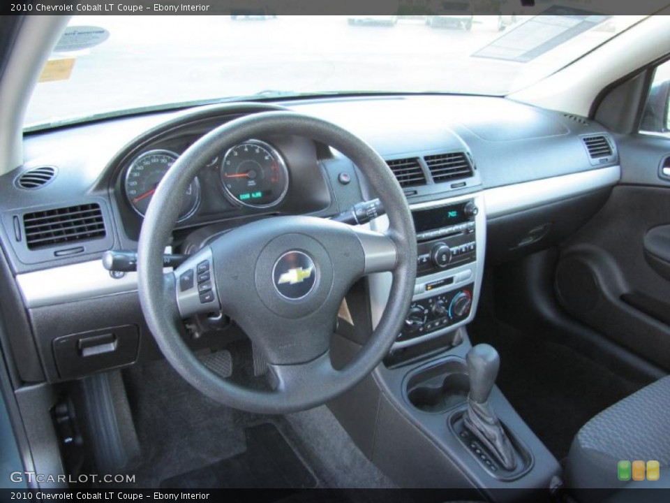 Ebony Interior Prime Interior for the 2010 Chevrolet Cobalt LT Coupe #39235108