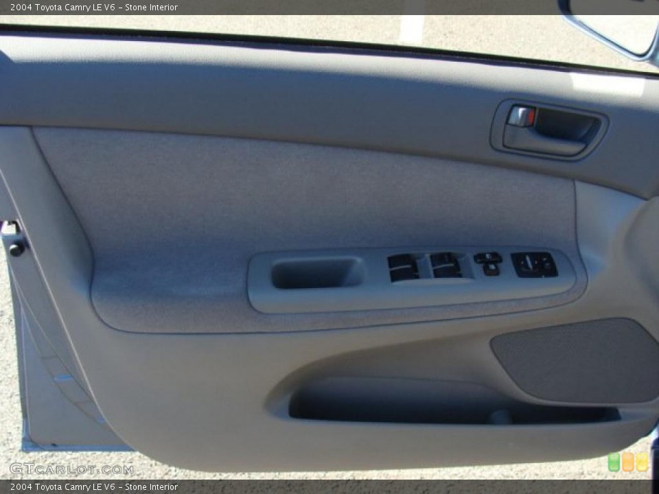 Stone Interior Door Panel for the 2004 Toyota Camry LE V6 #39242682