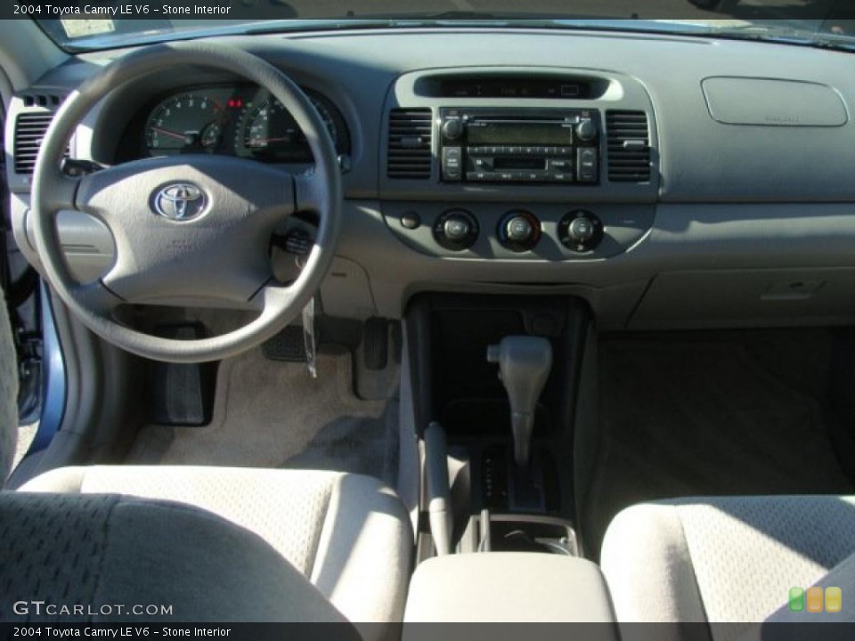 Stone Interior Dashboard for the 2004 Toyota Camry LE V6 #39242730