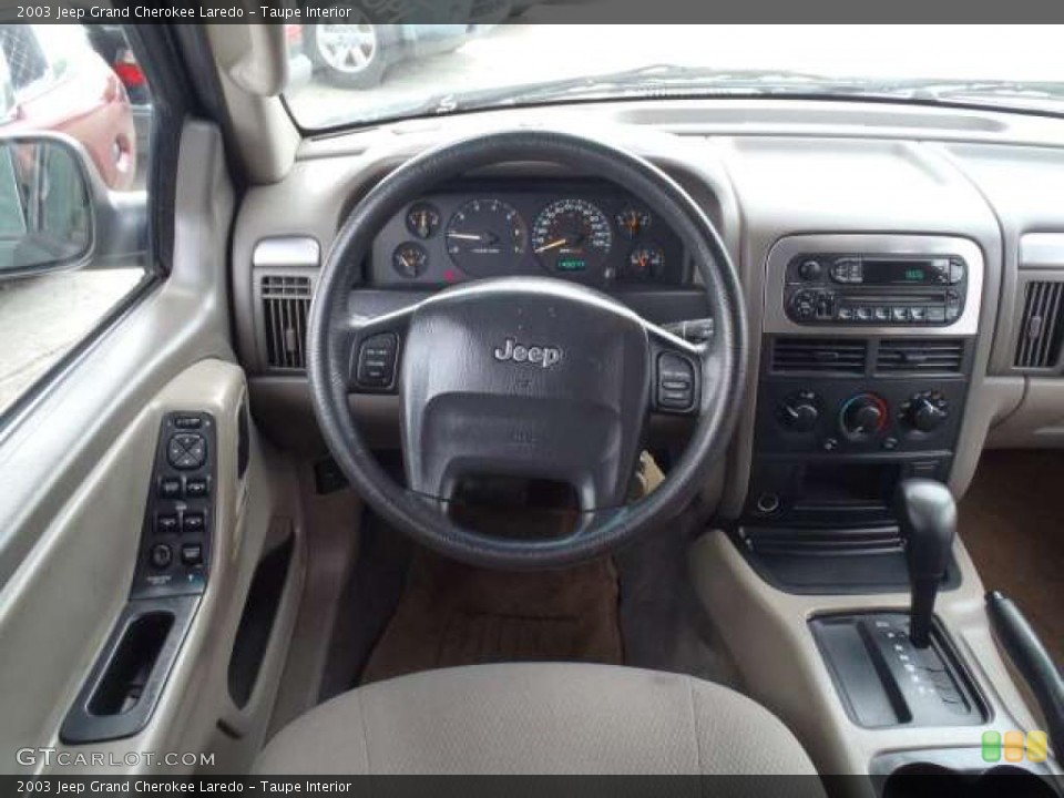 Taupe Interior Dashboard for the 2003 Jeep Grand Cherokee Laredo #39263691