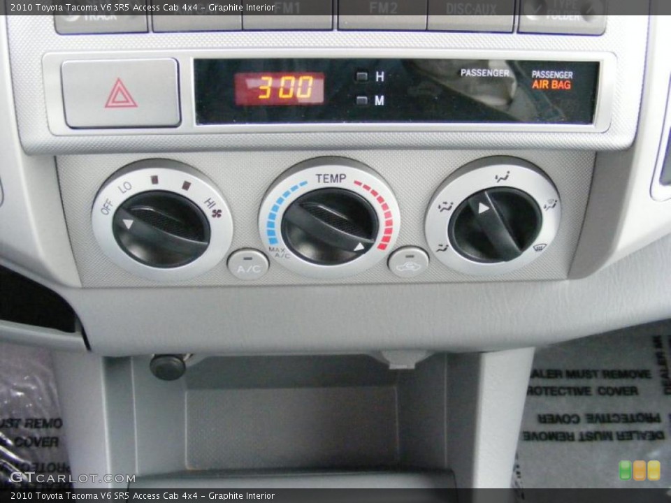 Graphite Interior Controls for the 2010 Toyota Tacoma V6 SR5 Access Cab 4x4 #39281983