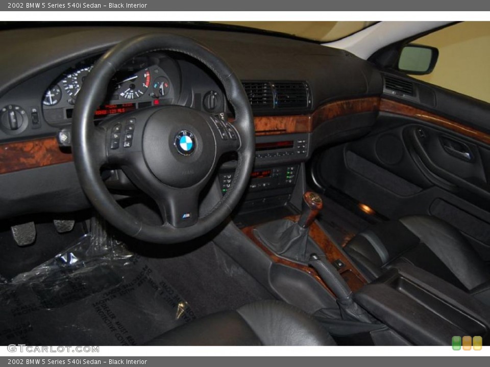 Black Interior Prime Interior for the 2002 BMW 5 Series 540i Sedan #39282295