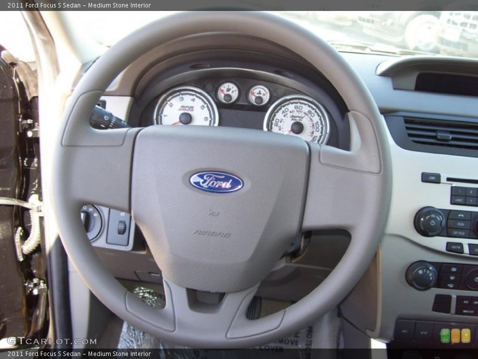 Medium Stone Interior Steering Wheel for the 2011 Ford Focus S Sedan #39286111