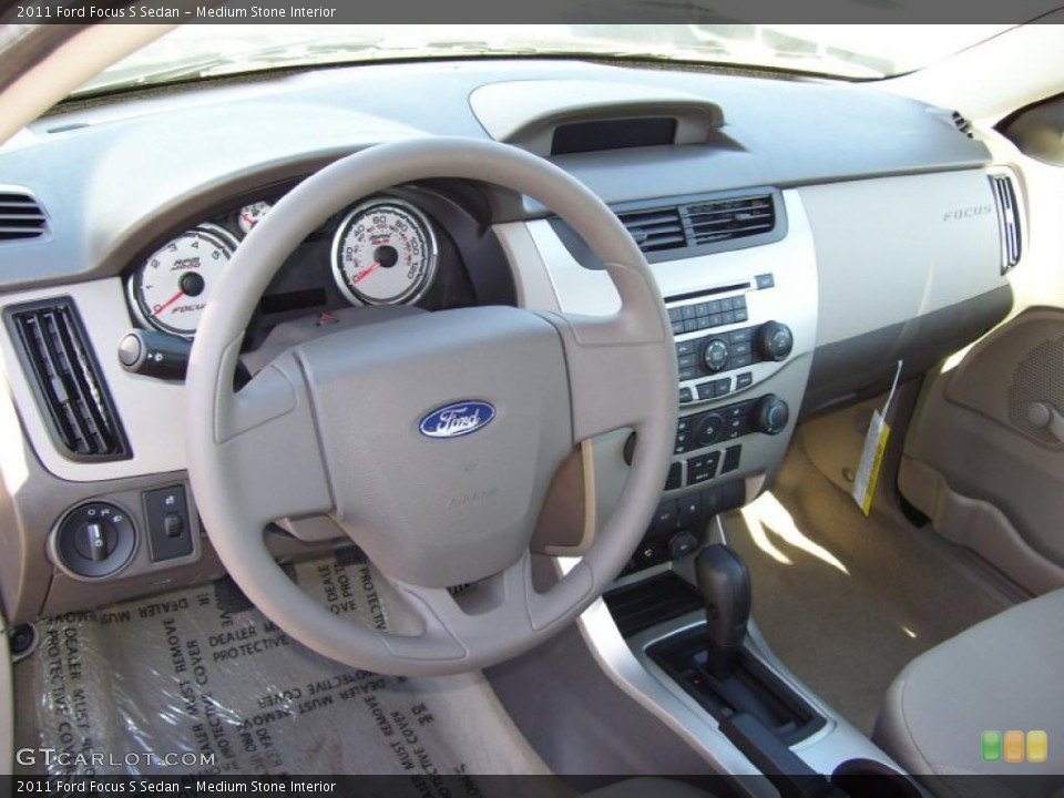 Medium Stone Interior Prime Interior for the 2011 Ford Focus S Sedan #39286127