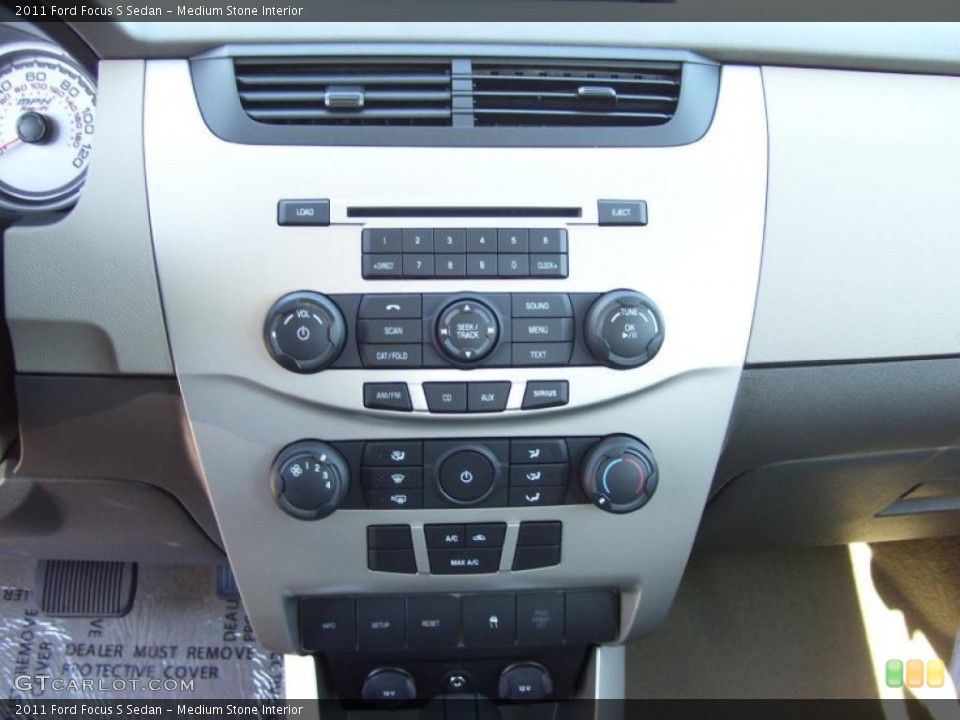 Medium Stone Interior Controls for the 2011 Ford Focus S Sedan #39286159