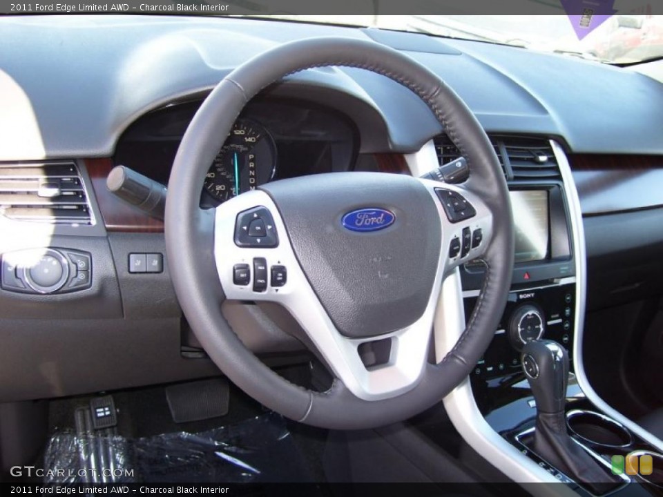 Charcoal Black Interior Steering Wheel for the 2011 Ford Edge Limited AWD #39286555