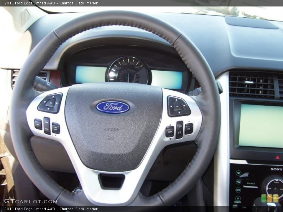 Charcoal Black Interior Steering Wheel for the 2011 Ford Edge Limited AWD #39286571