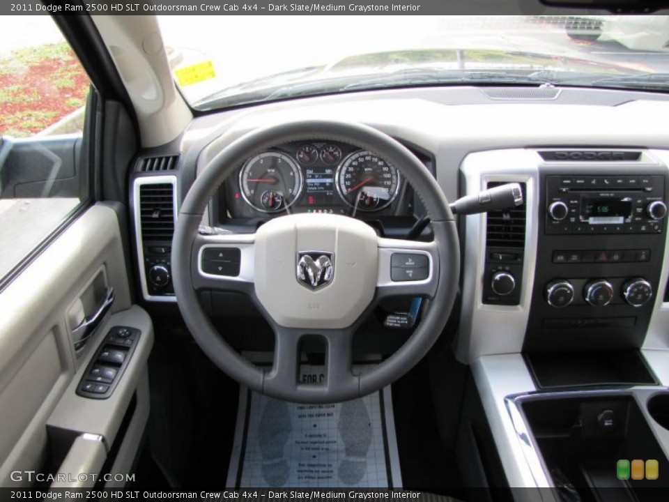 Dark Slate/Medium Graystone Interior Dashboard for the 2011 Dodge Ram 2500 HD SLT Outdoorsman Crew Cab 4x4 #39294527