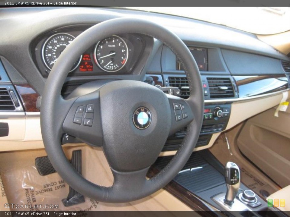 Beige Interior Dashboard for the 2011 BMW X5 xDrive 35i #39300497