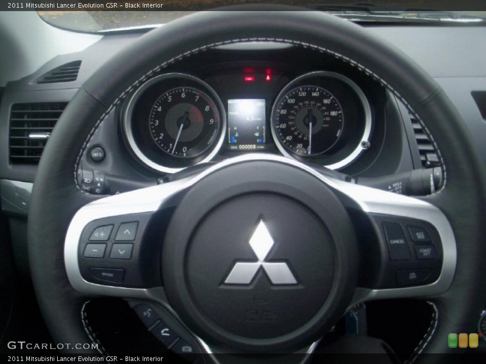 Black Interior Steering Wheel for the 2011 Mitsubishi Lancer Evolution GSR #39304393