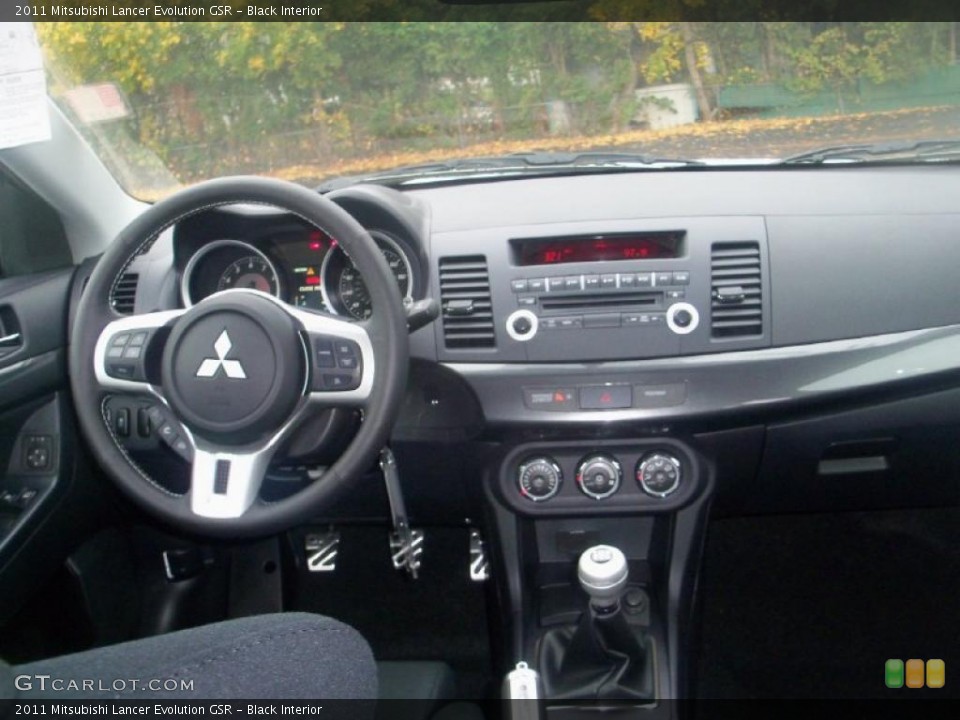 Black Interior Dashboard for the 2011 Mitsubishi Lancer Evolution GSR #39304729