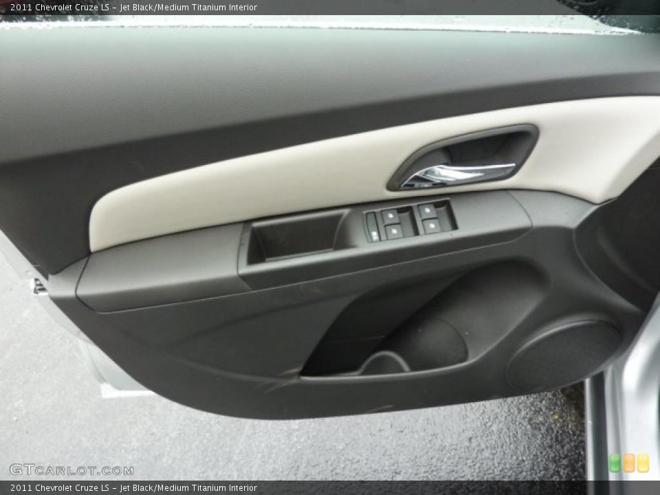 Jet Black/Medium Titanium Interior Door Panel for the 2011 Chevrolet Cruze LS #39310125