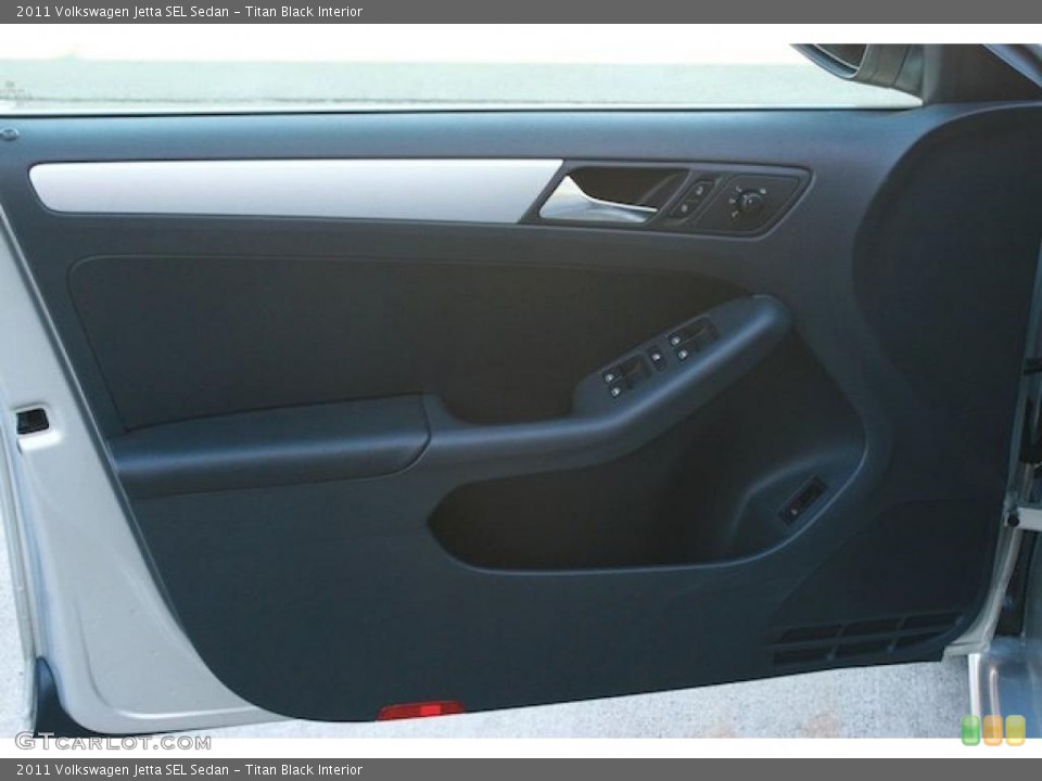 Titan Black Interior Door Panel for the 2011 Volkswagen Jetta SEL Sedan #39321401