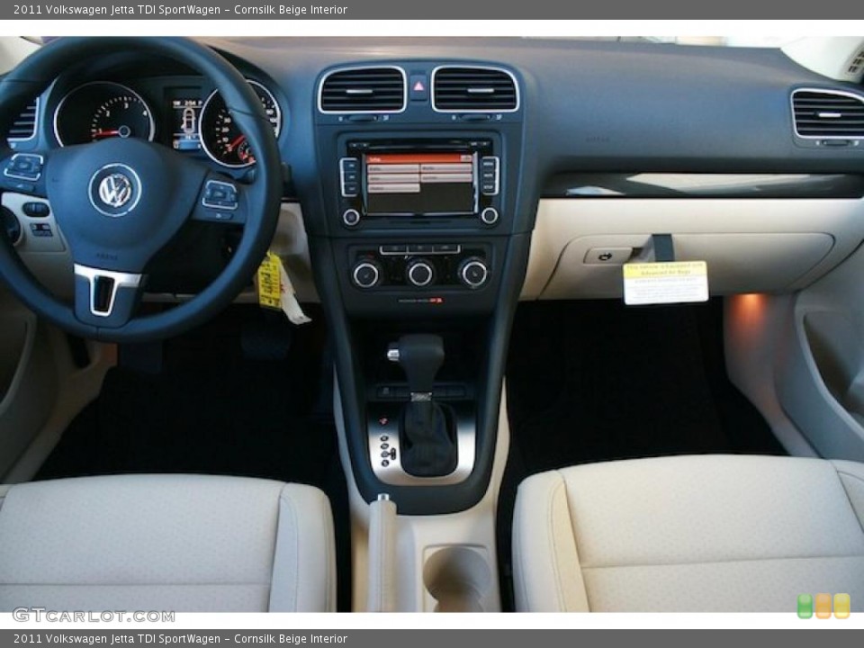 Cornsilk Beige Interior Dashboard for the 2011 Volkswagen Jetta TDI SportWagen #39323229