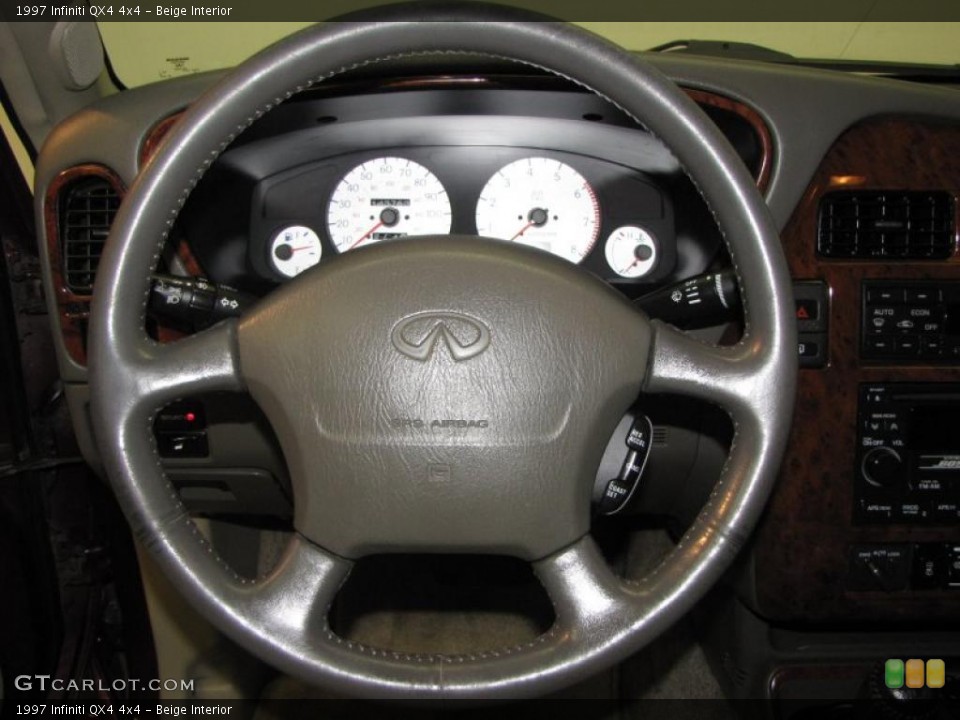Beige Interior Steering Wheel for the 1997 Infiniti QX4 4x4 #39324697