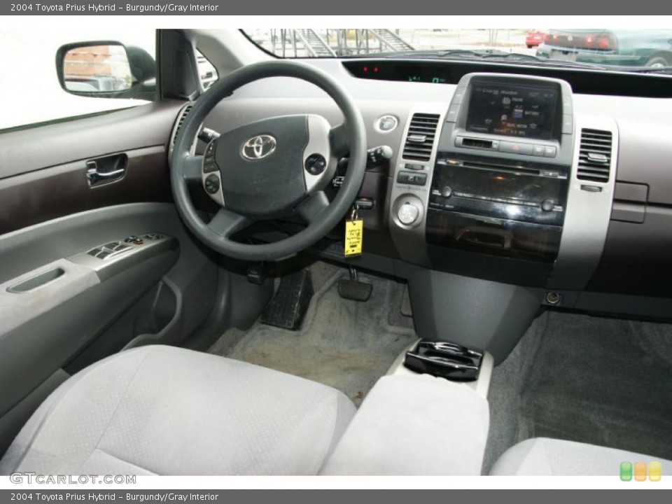 Burgundy/Gray Interior Prime Interior for the 2004 Toyota Prius Hybrid #39332440