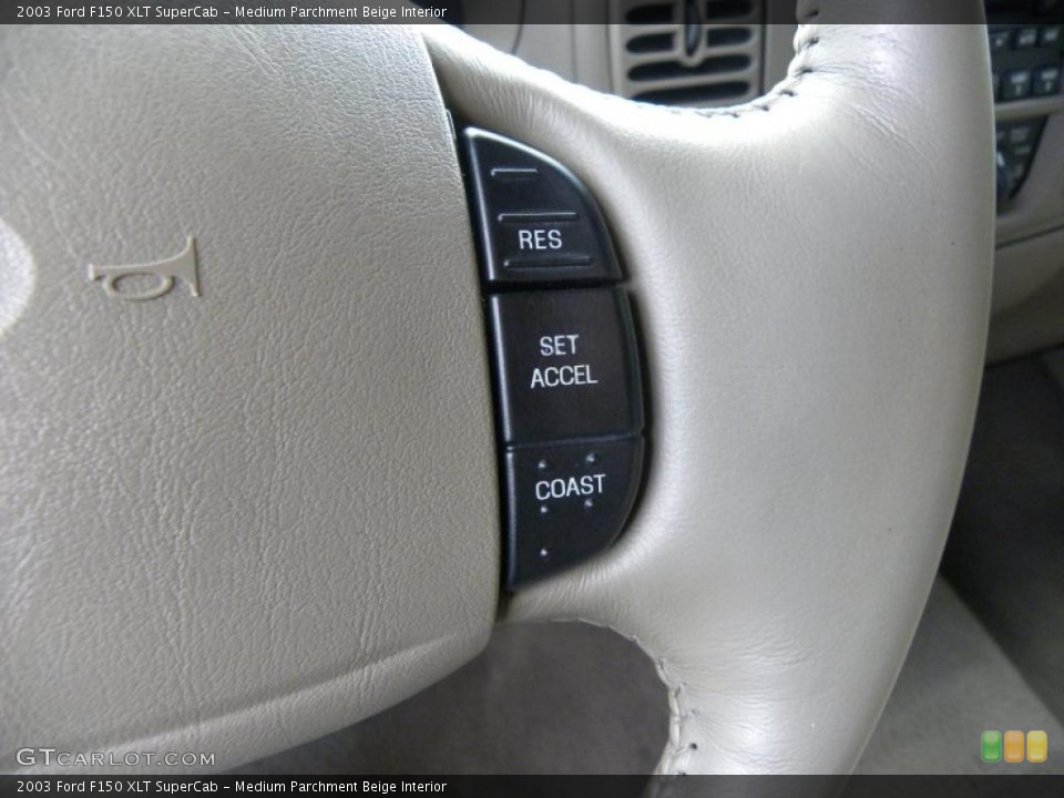 Medium Parchment Beige Interior Controls for the 2003 Ford F150 XLT SuperCab #39333240