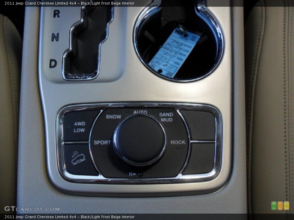 Black/Light Frost Beige Interior Controls for the 2011 Jeep Grand Cherokee Limited 4x4 #39360288
