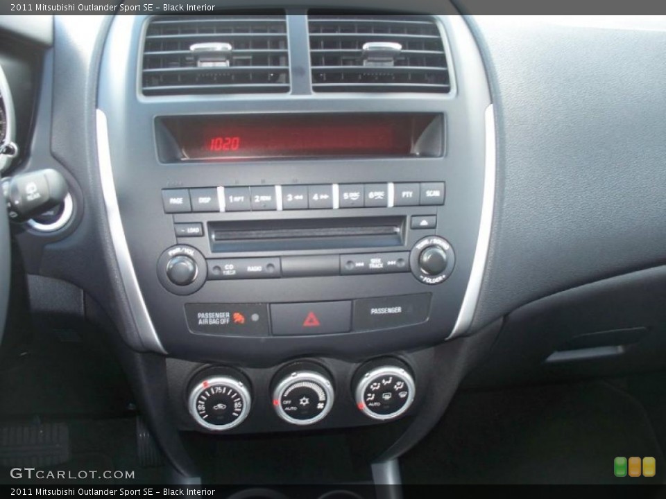 Black Interior Controls for the 2011 Mitsubishi Outlander Sport SE #39365232
