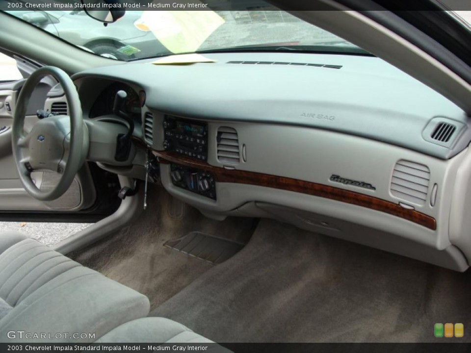 Medium Gray Interior Dashboard for the 2003 Chevrolet Impala  #39378278