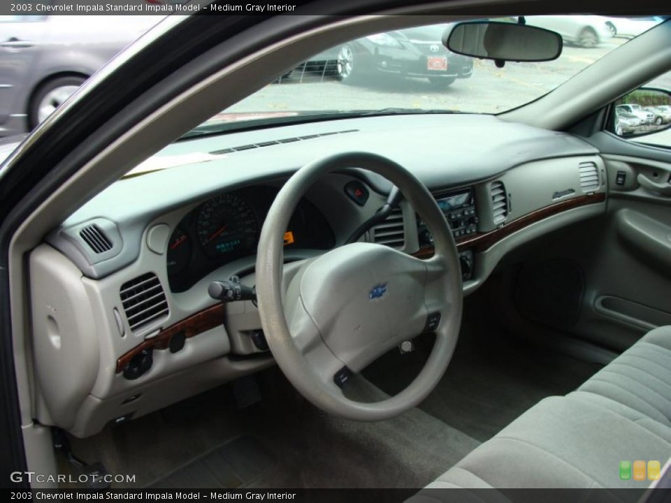 Medium Gray Interior Prime Interior for the 2003 Chevrolet Impala  #39378330