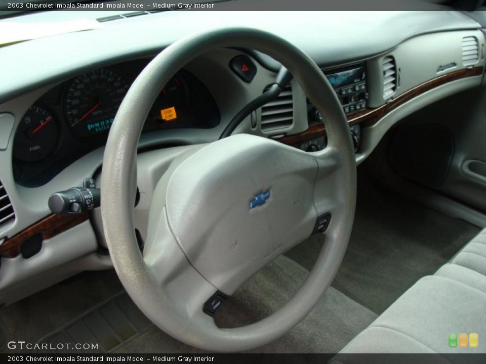 Medium Gray Interior Dashboard for the 2003 Chevrolet Impala  #39378342