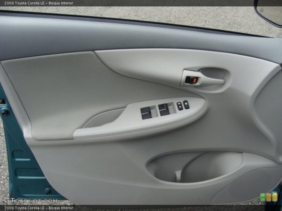 Bisque Interior Door Panel for the 2009 Toyota Corolla LE #39392453