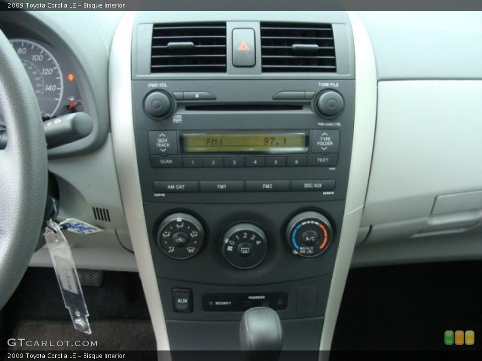 Bisque Interior Controls for the 2009 Toyota Corolla LE #39392537