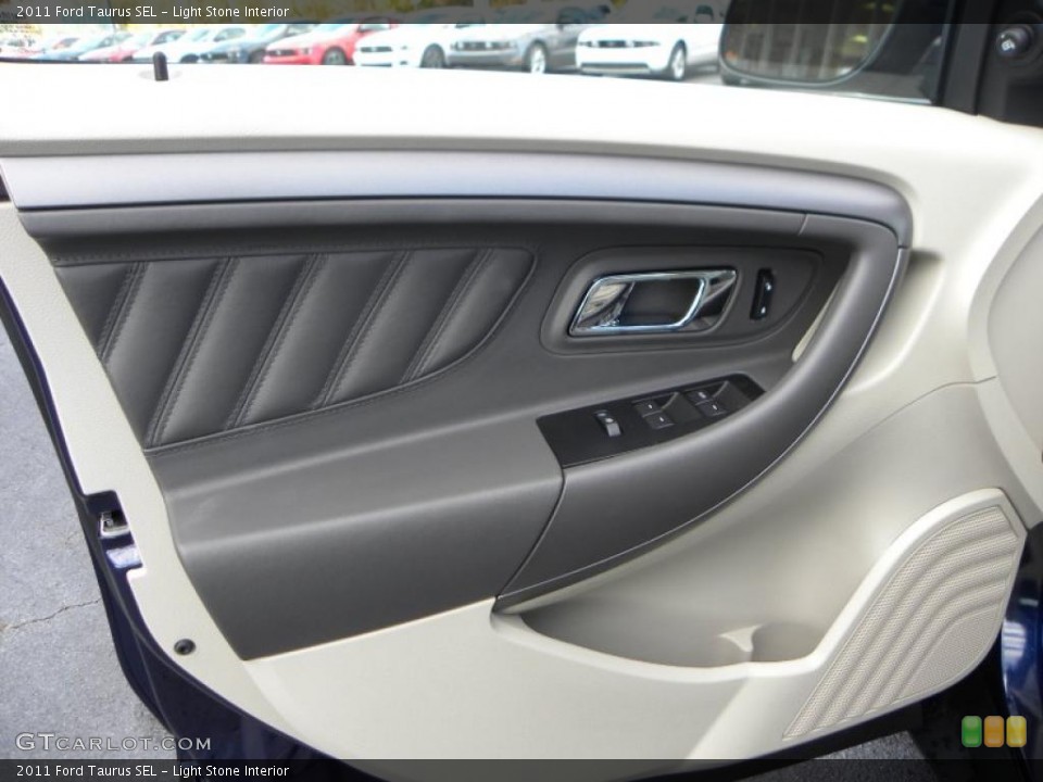 Light Stone Interior Door Panel for the 2011 Ford Taurus SEL #39400033