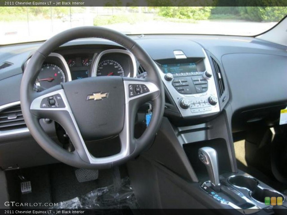Jet Black Interior Dashboard for the 2011 Chevrolet Equinox LT #39408605