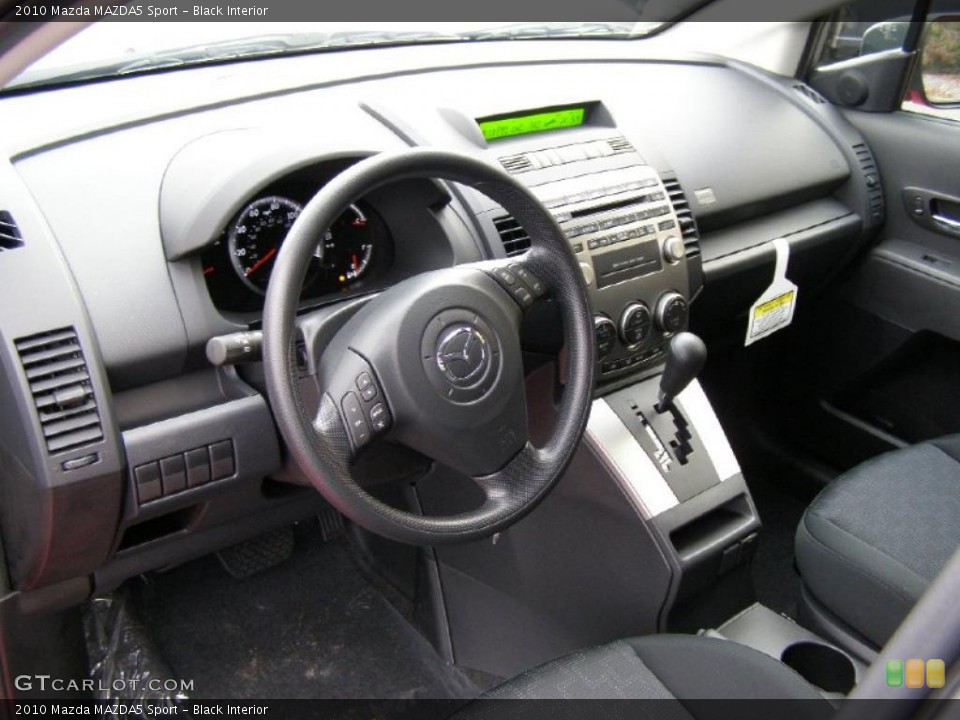 Black Interior Prime Interior for the 2010 Mazda MAZDA5 Sport #39410197