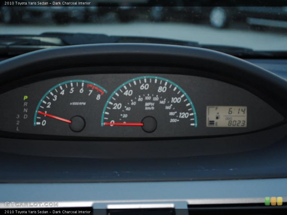 Dark Charcoal Interior Gauges for the 2010 Toyota Yaris Sedan #39419205