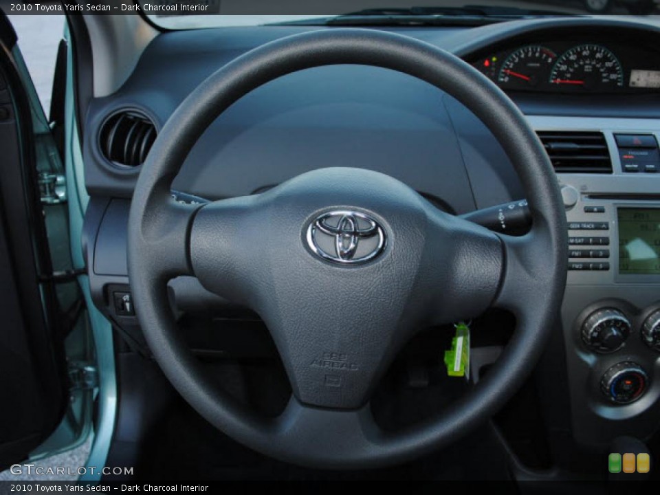 Dark Charcoal Interior Steering Wheel for the 2010 Toyota Yaris Sedan #39419217