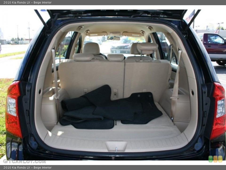 Beige Interior Trunk for the 2010 Kia Rondo LX #39419653