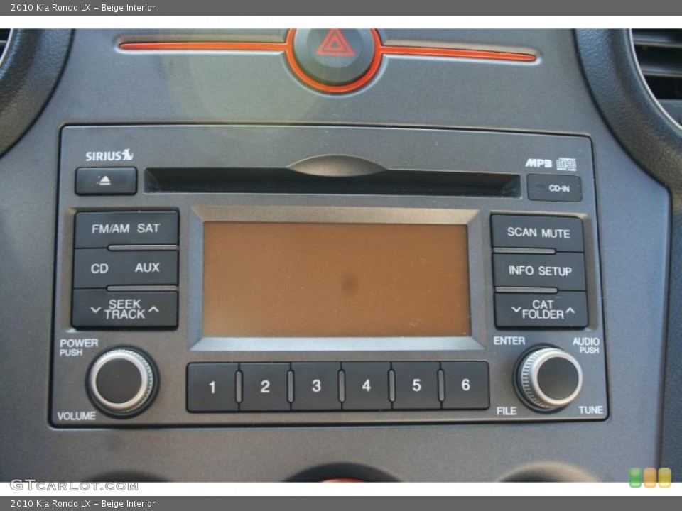 Beige Interior Controls for the 2010 Kia Rondo LX #39419677