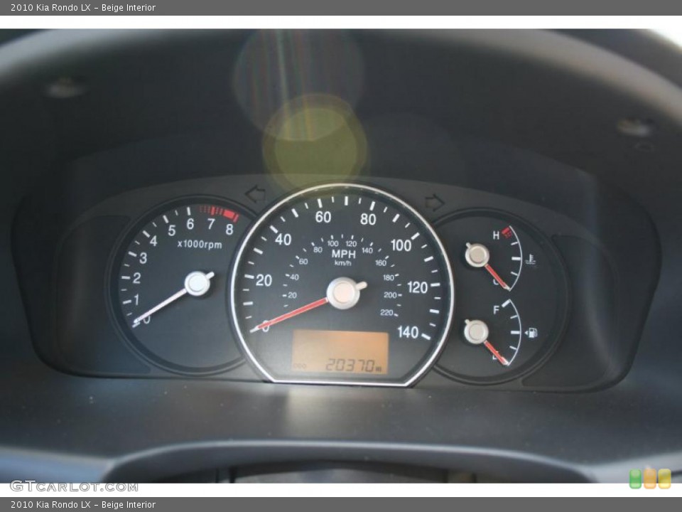 Beige Interior Gauges for the 2010 Kia Rondo LX #39419729