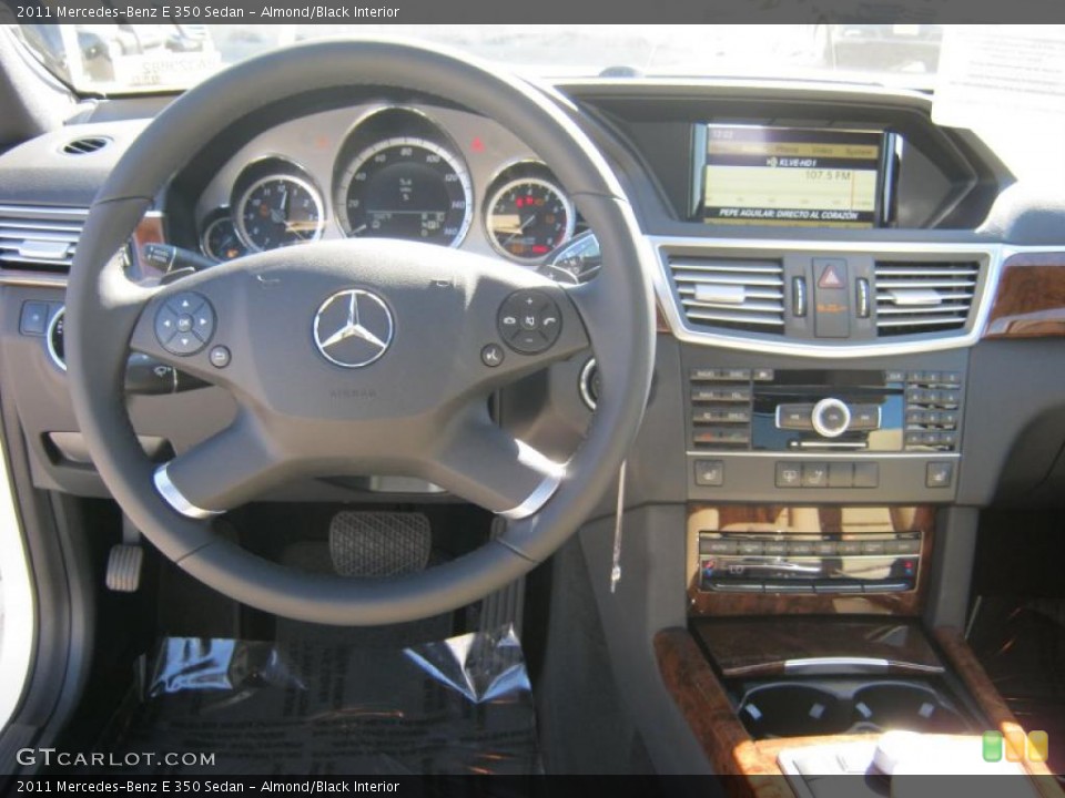 Almond/Black Interior Dashboard for the 2011 Mercedes-Benz E 350 Sedan #39421702