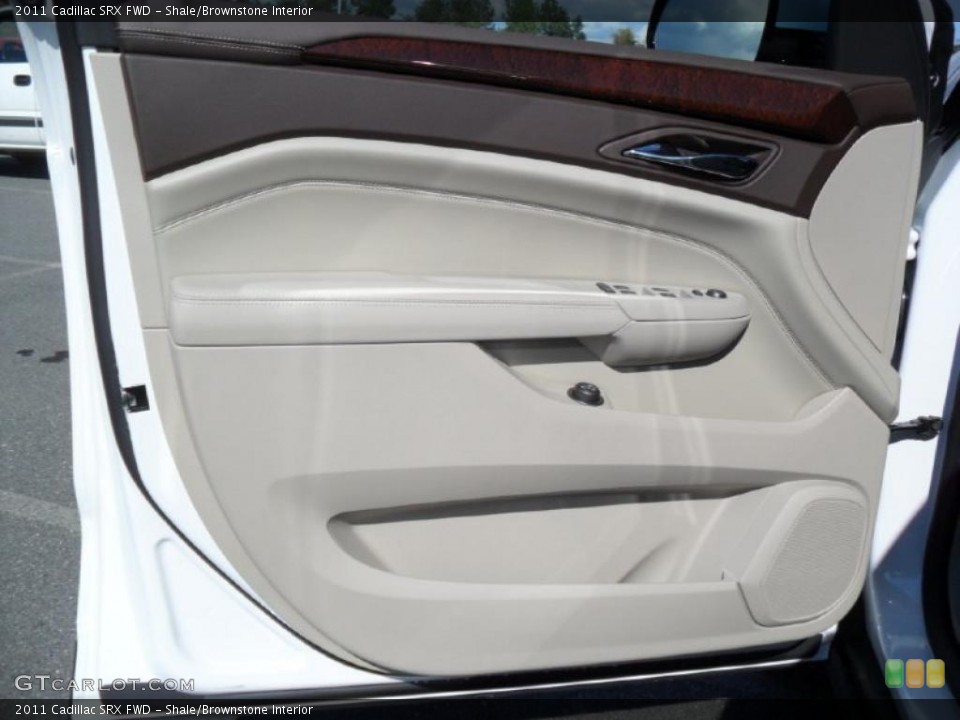 Shale/Brownstone Interior Door Panel for the 2011 Cadillac SRX FWD #39421858