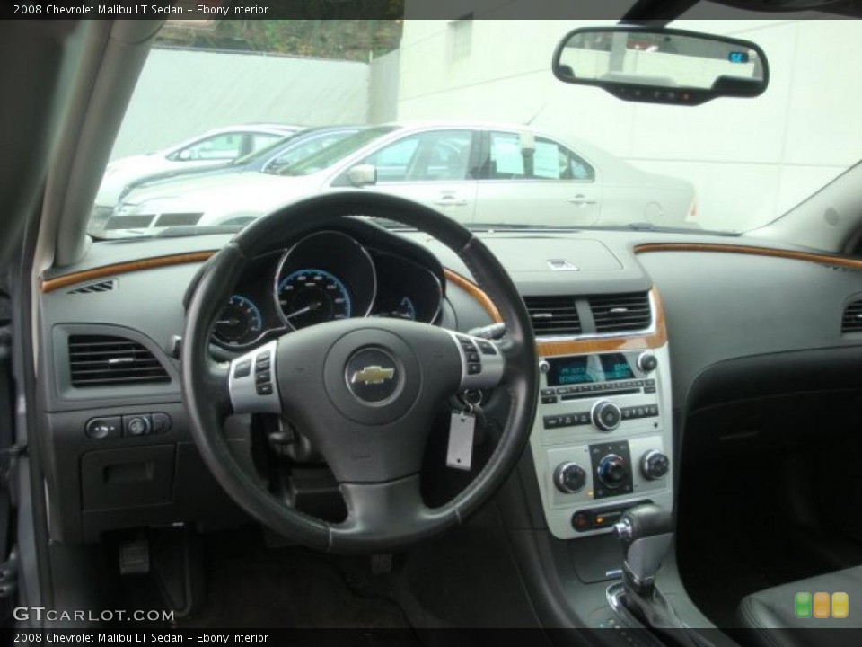 Ebony Interior Dashboard for the 2008 Chevrolet Malibu LT Sedan #39427566