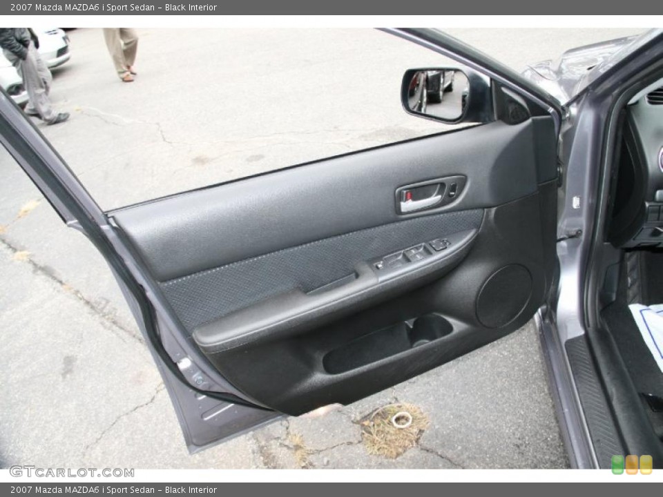 Black Interior Door Panel for the 2007 Mazda MAZDA6 i Sport Sedan #39428650