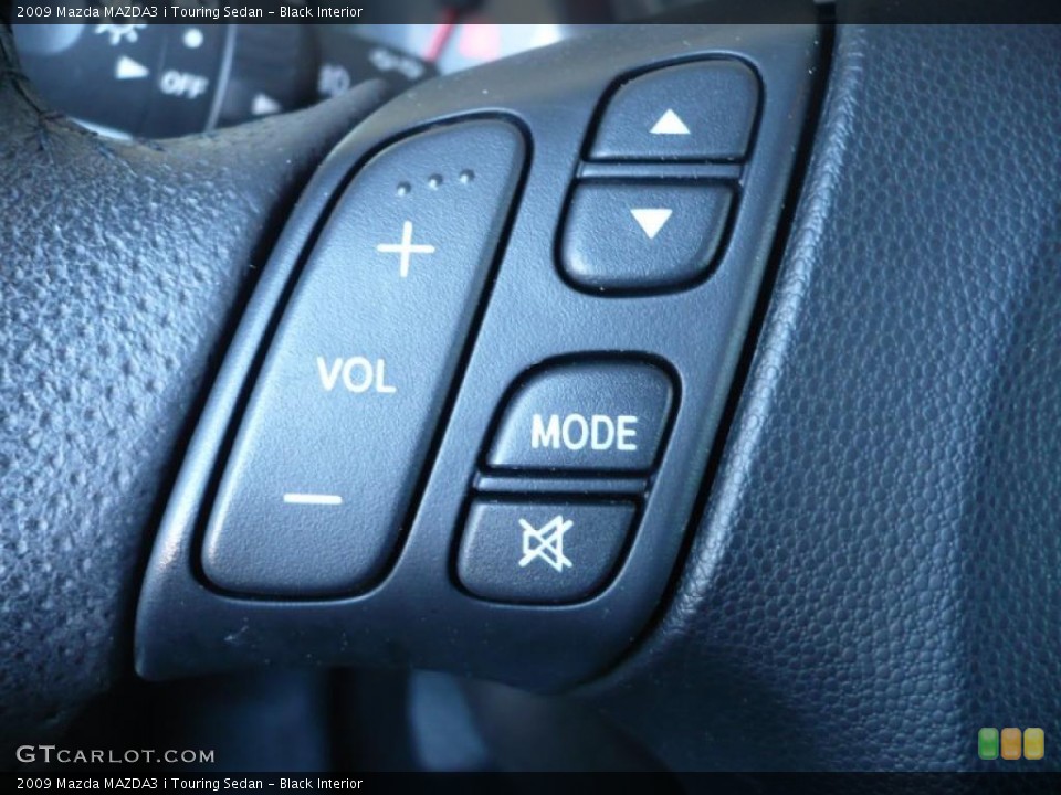 Black Interior Controls for the 2009 Mazda MAZDA3 i Touring Sedan #39429606