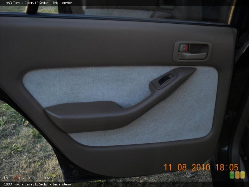 Beige Interior Door Panel for the 1993 Toyota Camry LE Sedan #39456446
