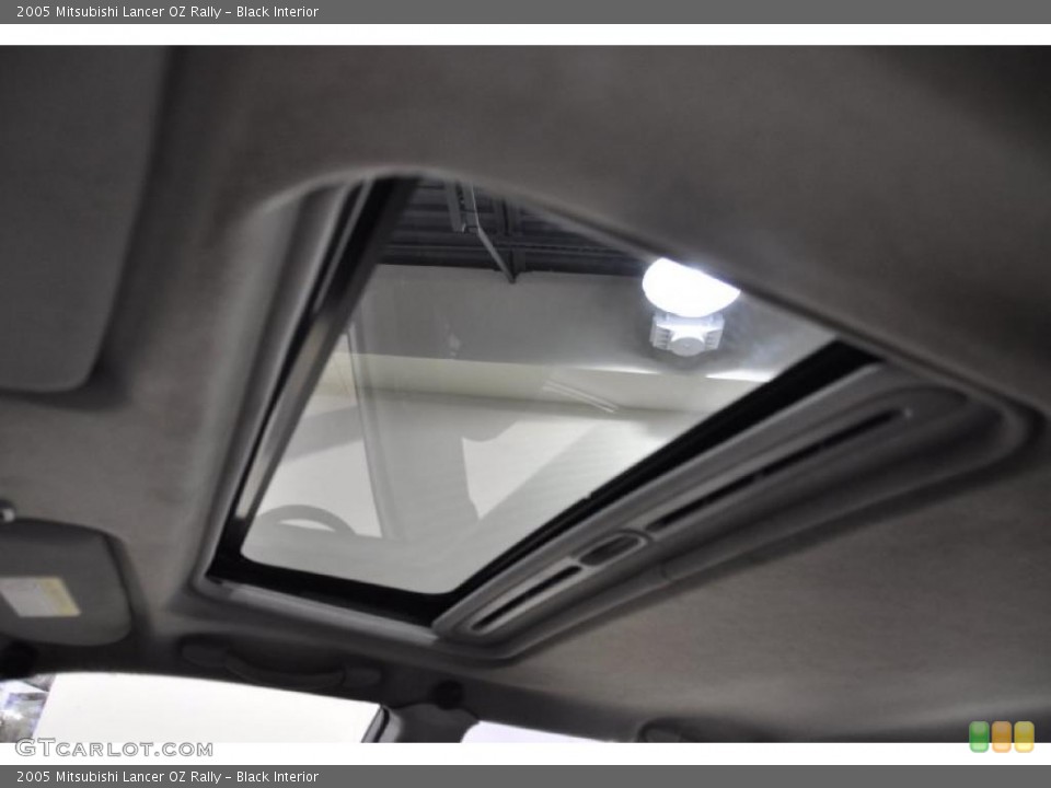 Black Interior Sunroof for the 2005 Mitsubishi Lancer OZ Rally #39460370