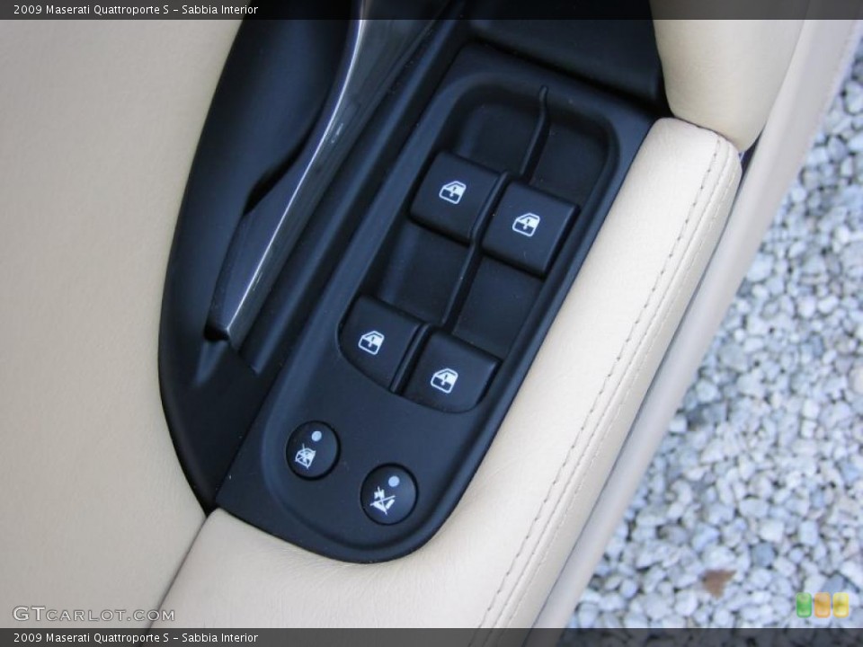 Sabbia Interior Controls for the 2009 Maserati Quattroporte S #39466566
