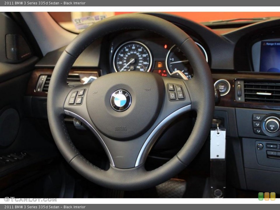 Black Interior Steering Wheel for the 2011 BMW 3 Series 335d Sedan #39475074