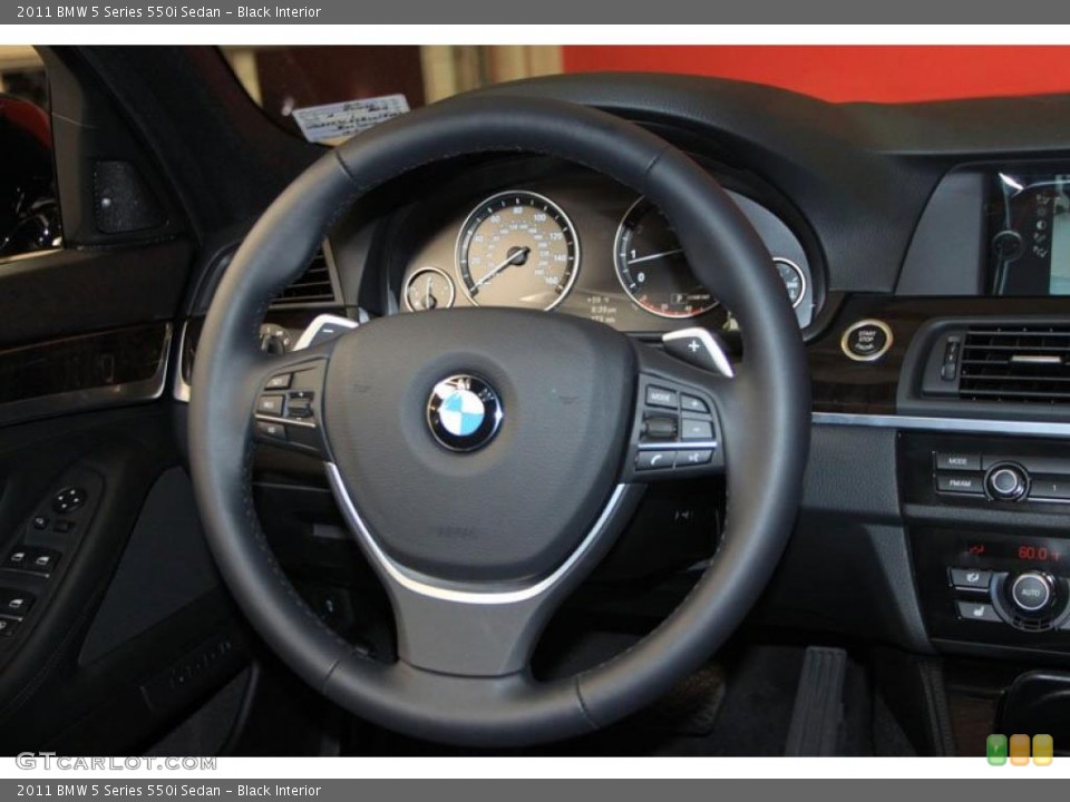 Black Interior Steering Wheel for the 2011 BMW 5 Series 550i Sedan #39479546