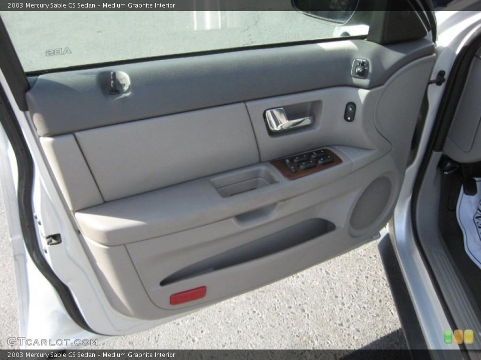 Medium Graphite Interior Door Panel for the 2003 Mercury Sable GS Sedan #39486181