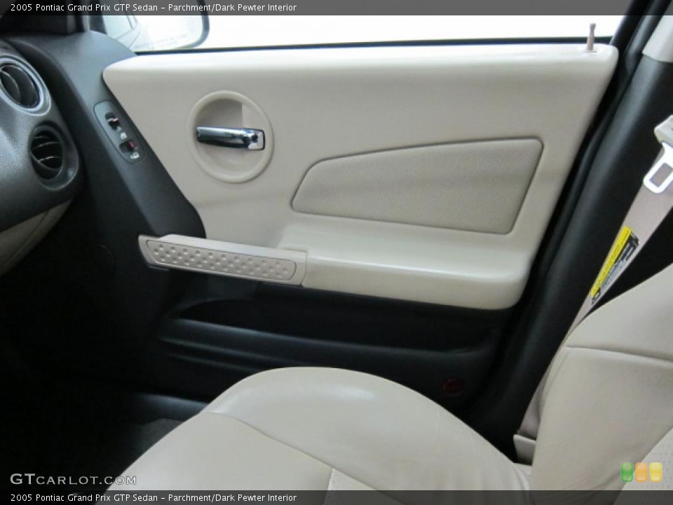 Parchment/Dark Pewter Interior Door Panel for the 2005 Pontiac Grand Prix GTP Sedan #39512444